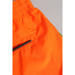 Dolce & Gabbana Orange Polyester Beachwear Men Shorts Swimwear with zip pocket detail.