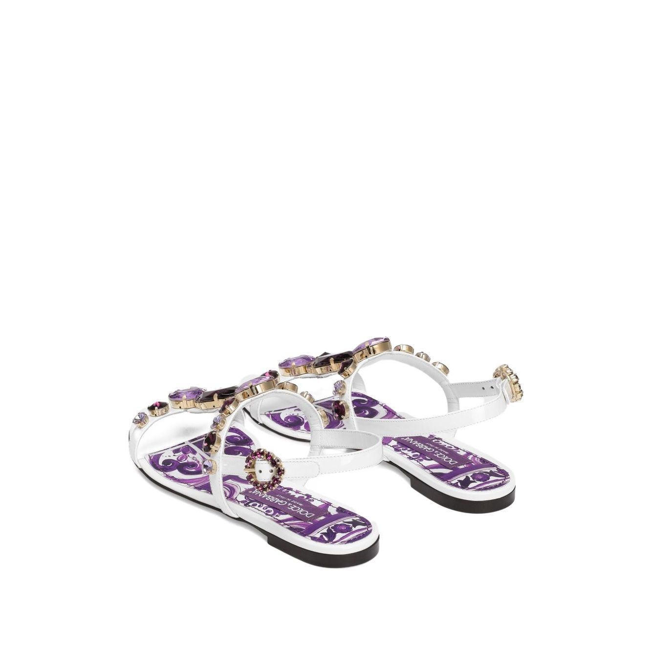 Dolce & Gabbana Sandals Purple with white rhinestone embellishments, side buckle fastening, and flat sole Maiolica leather design.