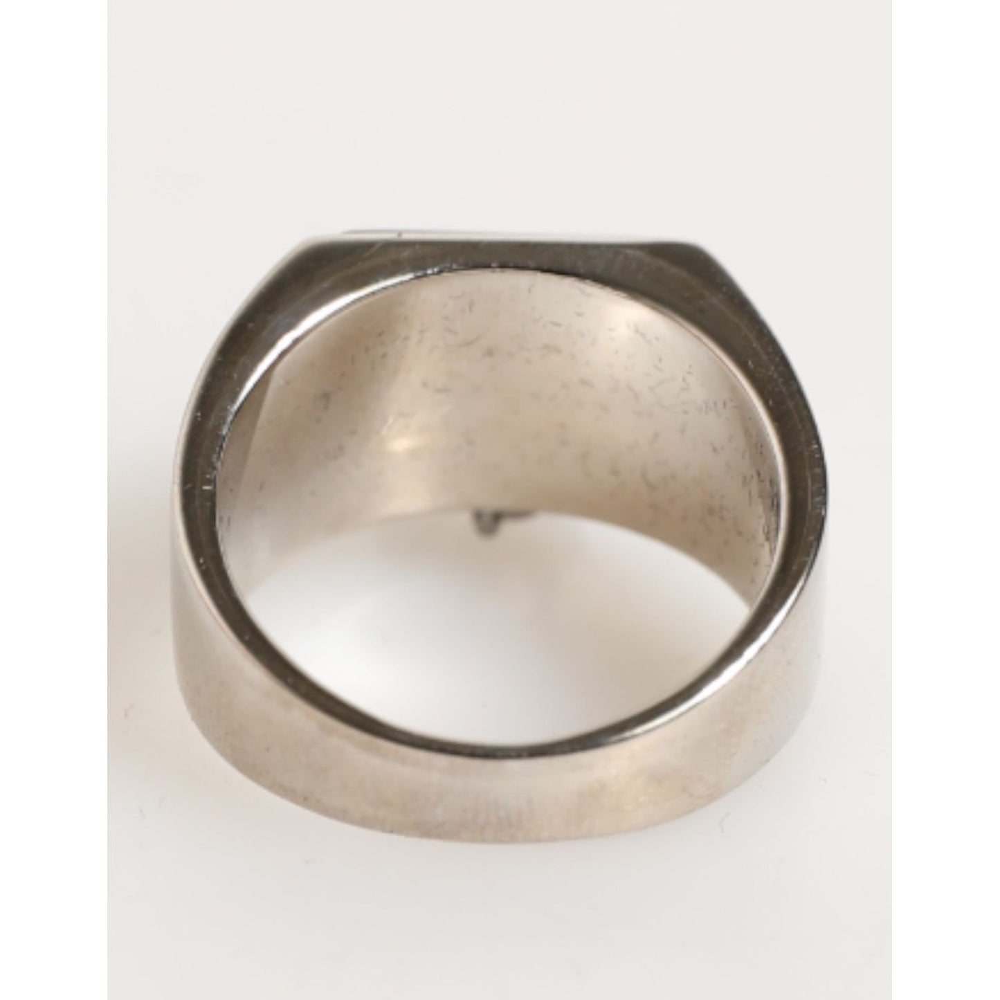 Dolce & Gabbana Silver Tone Pyramid DG Logo Real Brass Ring showcasing geometric design and polished brass finish, rear view.