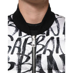 Close-up of the Dolce & Gabbana White Black Graffiti Logo Puffer Bomber Jacket showcasing the graffiti-style print.