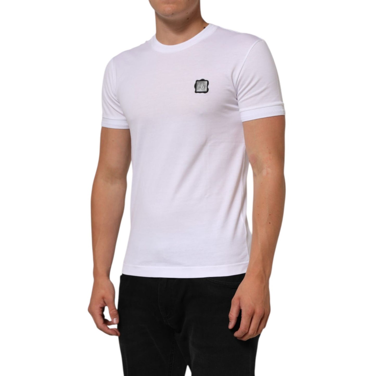 Dolce & Gabbana White Cotton Logo Patch Crew Neck T-shirt worn by model, showcasing soft cotton material and distinct logo patch.