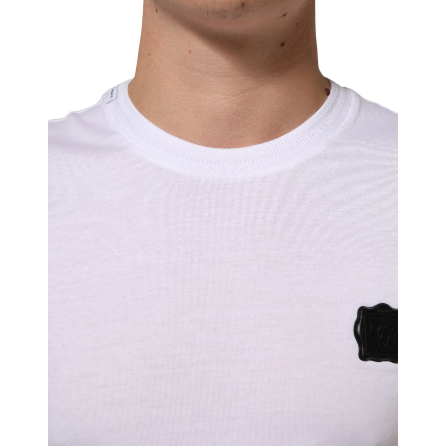 Dolce & Gabbana White Cotton Logo Patch Crew Neck T-shirt featuring soft cotton material and distinctive logo patch, made in Italy.