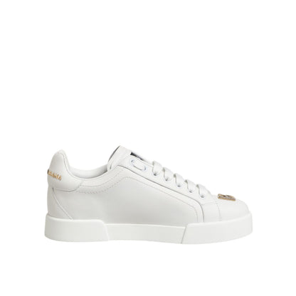 Dolce & Gabbana White DG Leather Low Top Sneakers Shoes in smooth white leather with DG logo, classic silhouette, and rubber sole.