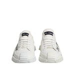 Dolce & Gabbana White Logo Graffiti Low Top Sneakers Shoes, featuring black graffiti-style logo on white canvas with rubber soles.