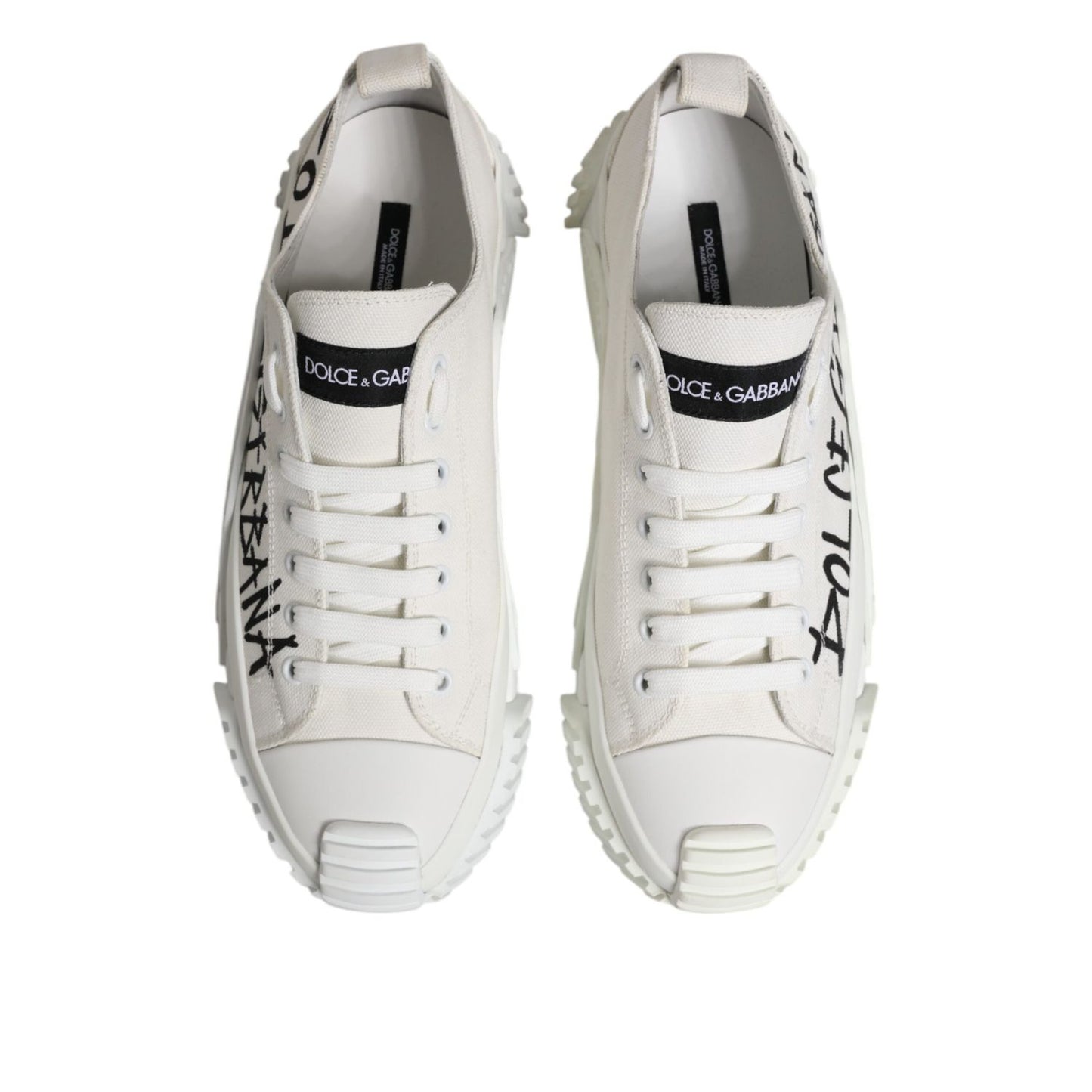 Dolce & Gabbana White Logo Graffiti Low Top Sneakers Shoes featuring black graffiti-style logo on white canvas with rubber sole.