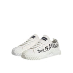 Dolce & Gabbana White Logo Graffiti Low Top Sneakers Shoes featuring black graffiti logo, white canvas, rubber sole, lace-up closure.
