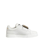 Dolce & Gabbana White Logo Plaque Low Top Men Sneakers Shoes in calf leather with rubber sole, lace up closure, and logo details.
