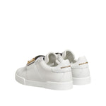 Dolce & Gabbana White Logo Plaque Low Top Men Sneakers Shoes in white calf leather with rubber sole and lace-up closure, back view.
