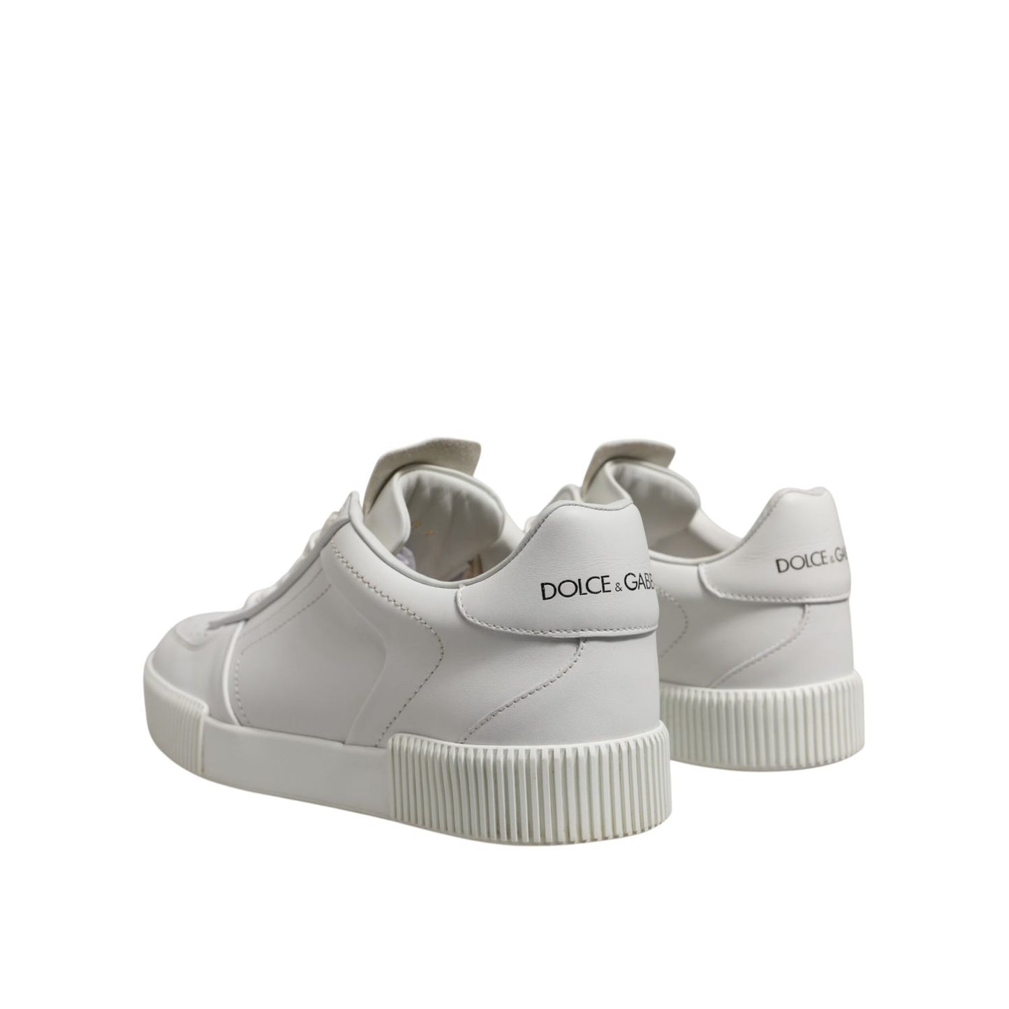 Dolce & Gabbana White Miami Leather Low Top Sneakers Men Shoes with black graffiti-style logo, rubber sole, lace-up closure.