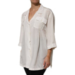 Dolce & Gabbana White Silk Collared 3/4 Sleeves Blouse Top with button closure and front flap pockets.