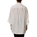 Back view of Dolce & Gabbana White Silk Collared 3/4 Sleeves Blouse Top showcasing lightweight silk fabric and elegant design.