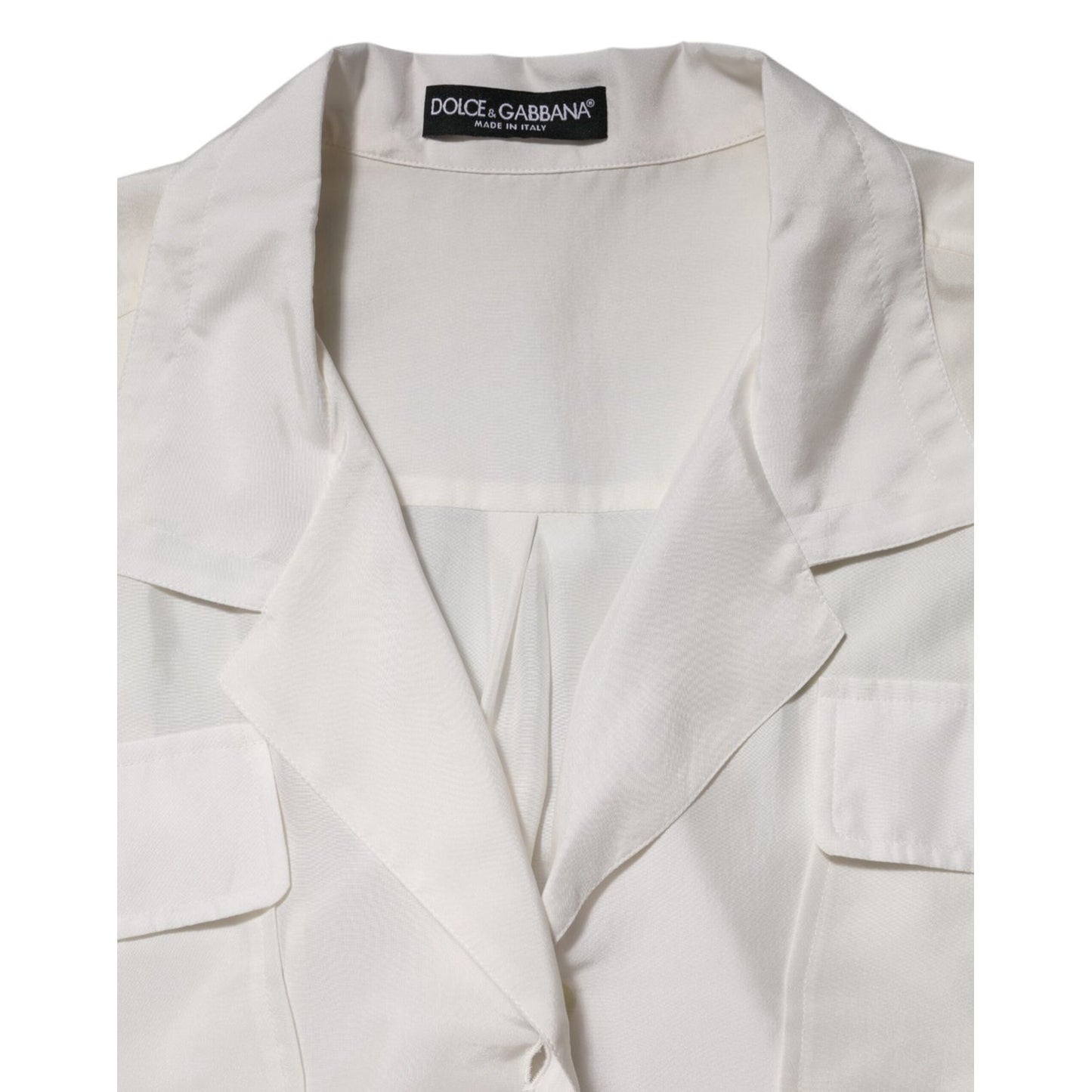 Dolce & Gabbana White Silk Collared 3/4 Sleeves Blouse Top with button closure and front flap pockets, made in Italy.