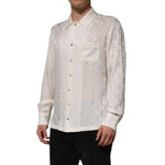 Model wearing Dolce & Gabbana White Silk DG Logo Print Long Sleeves Shirt with classic collar and button-down front.