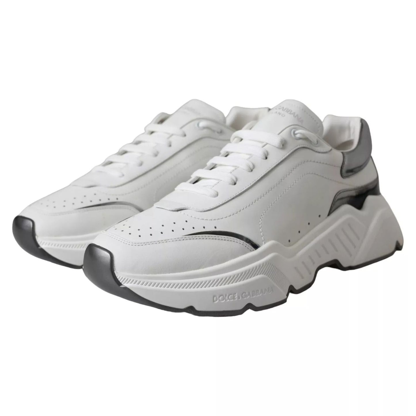 Dolce & Gabbana White Silver Leather Sport DAYMASTER Sneakers, side view, showing rubber sole and logo details, minor miscoloration.