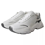Dolce & Gabbana White Silver Leather Sport DAYMASTER Sneakers, side view, showing rubber sole and logo details, minor miscoloration.
