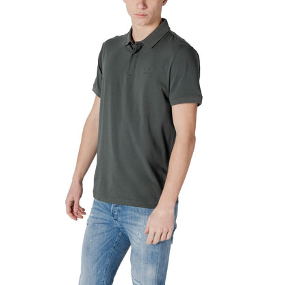 Man wearing EA7 Emporio Armani Green Cotton Polo Shirt, showcasing comfort and fit for casual outfits
