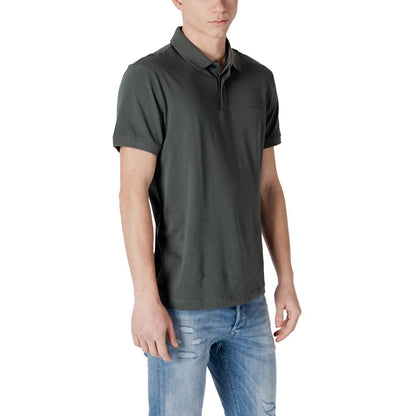 Man wearing EA7 Emporio Armani Green Cotton Polo Shirt, short-sleeved, high-quality materials, casual and comfortable fit