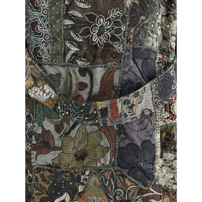 Close-up of Ella Multicolor Cotton Clothing patchwork with embroidered inserts and rich floral design for AW25 season