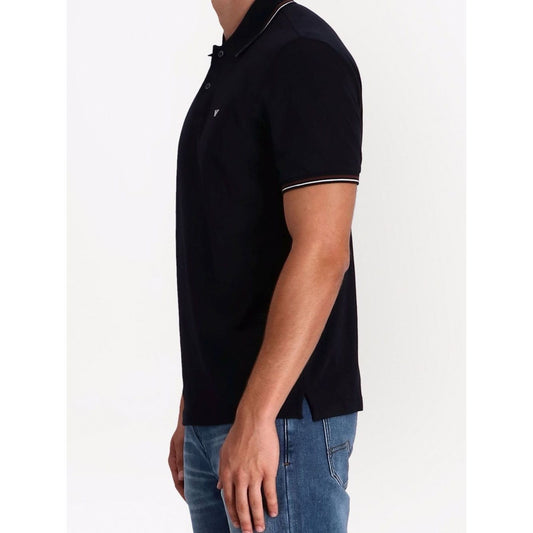 Man wearing Emporio Armani T-shirts and Polos Blue, navy blue cotton-blend polo with embroidered logo and short sleeves.
