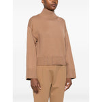 Woman wearing Fabiana Filippi Sweaters Camel, brown high neck wool jumper with ribbed cuffs and hem.