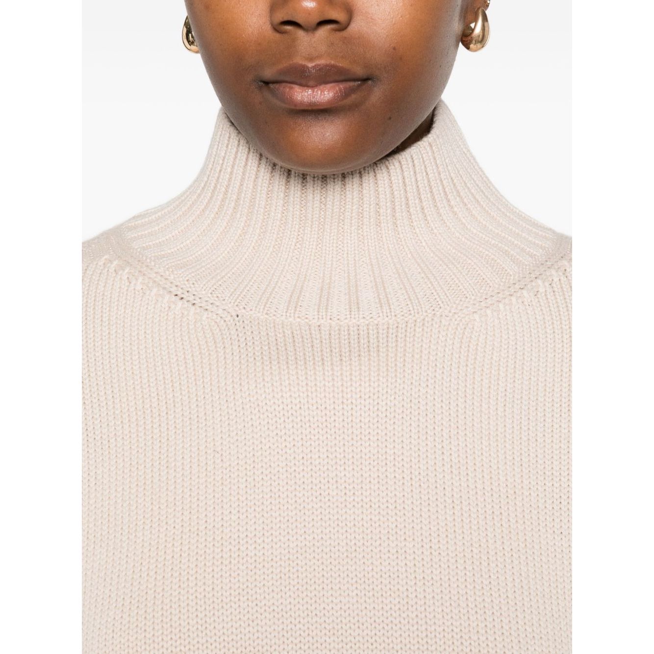 Fabiana Filippi Sweaters Powder wool turtle-neck jumper with high neck and ribbed knit detail in light beige, close-up view.