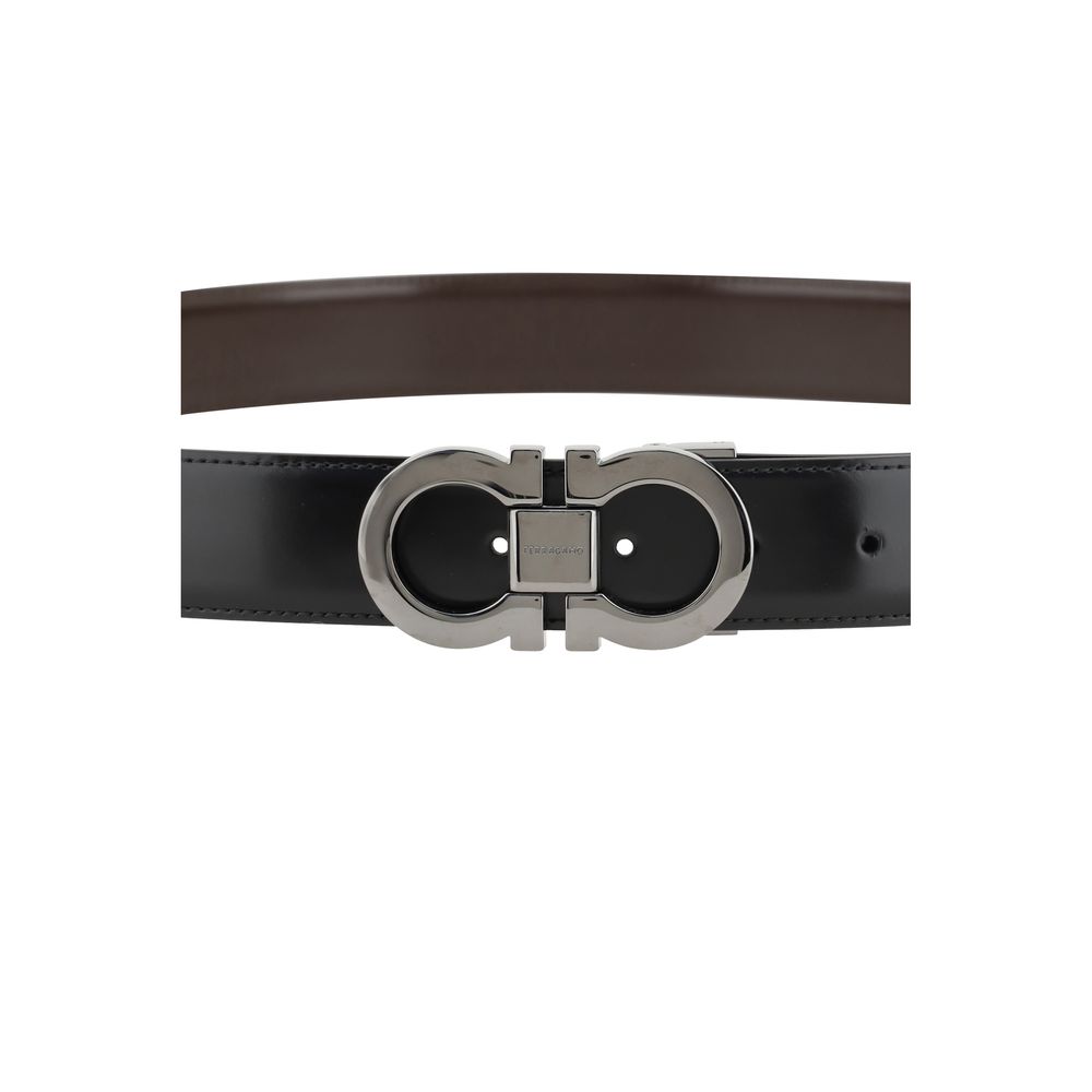 Ferragamo Black Calf Leather Bos Taurus Regular Belt with reversible design and Gancini logo buckle, 3 cm wide.