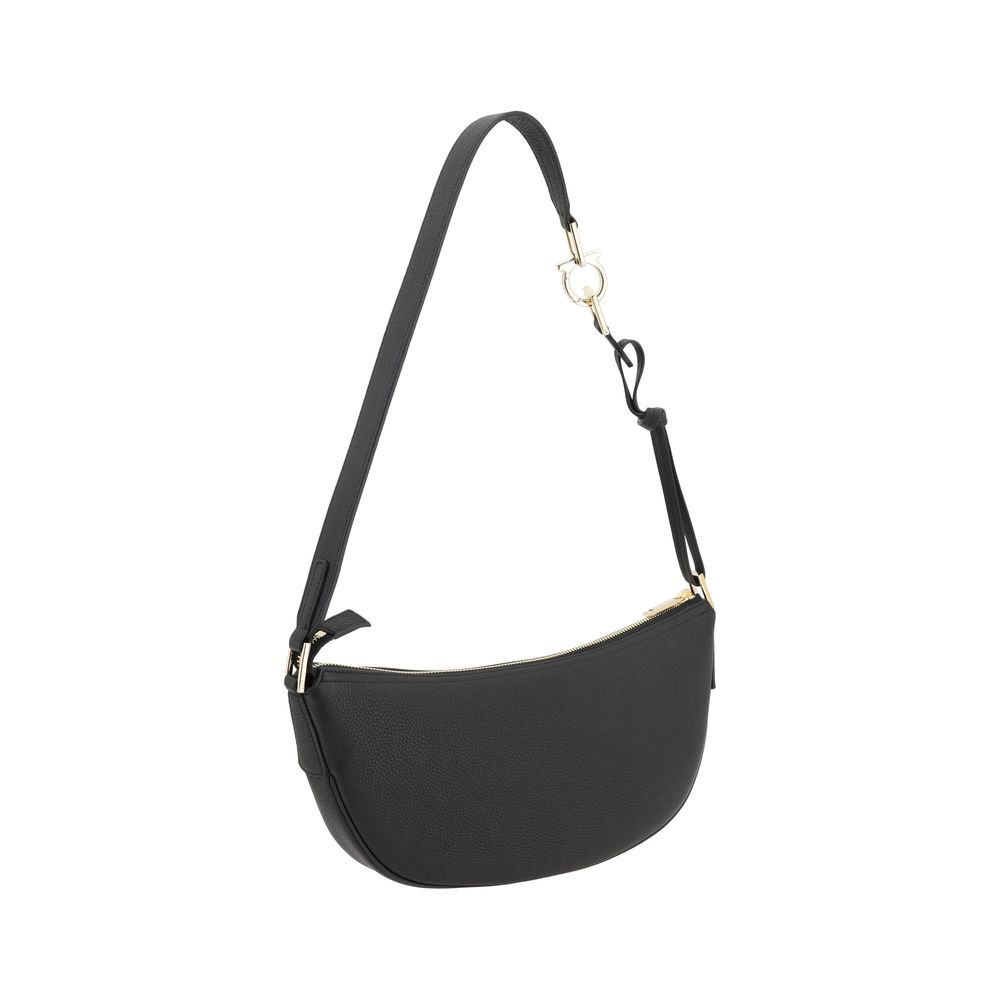 Front view with bag zipped and handles upright.