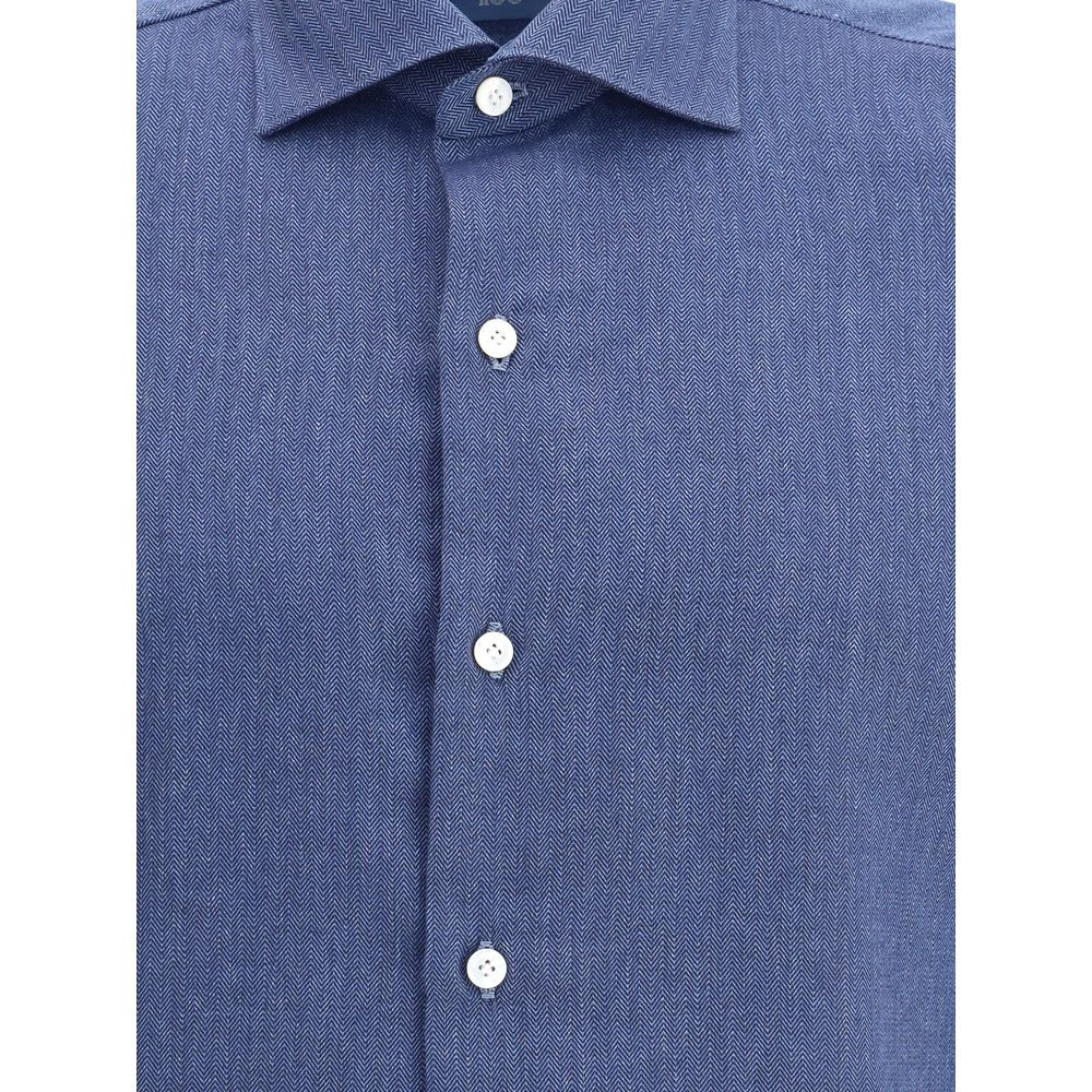 Close-up of Finamore Blue Cotton Dress Shirt with classic collar and button closure, 100% cotton fabric for elegant, everyday wear.
