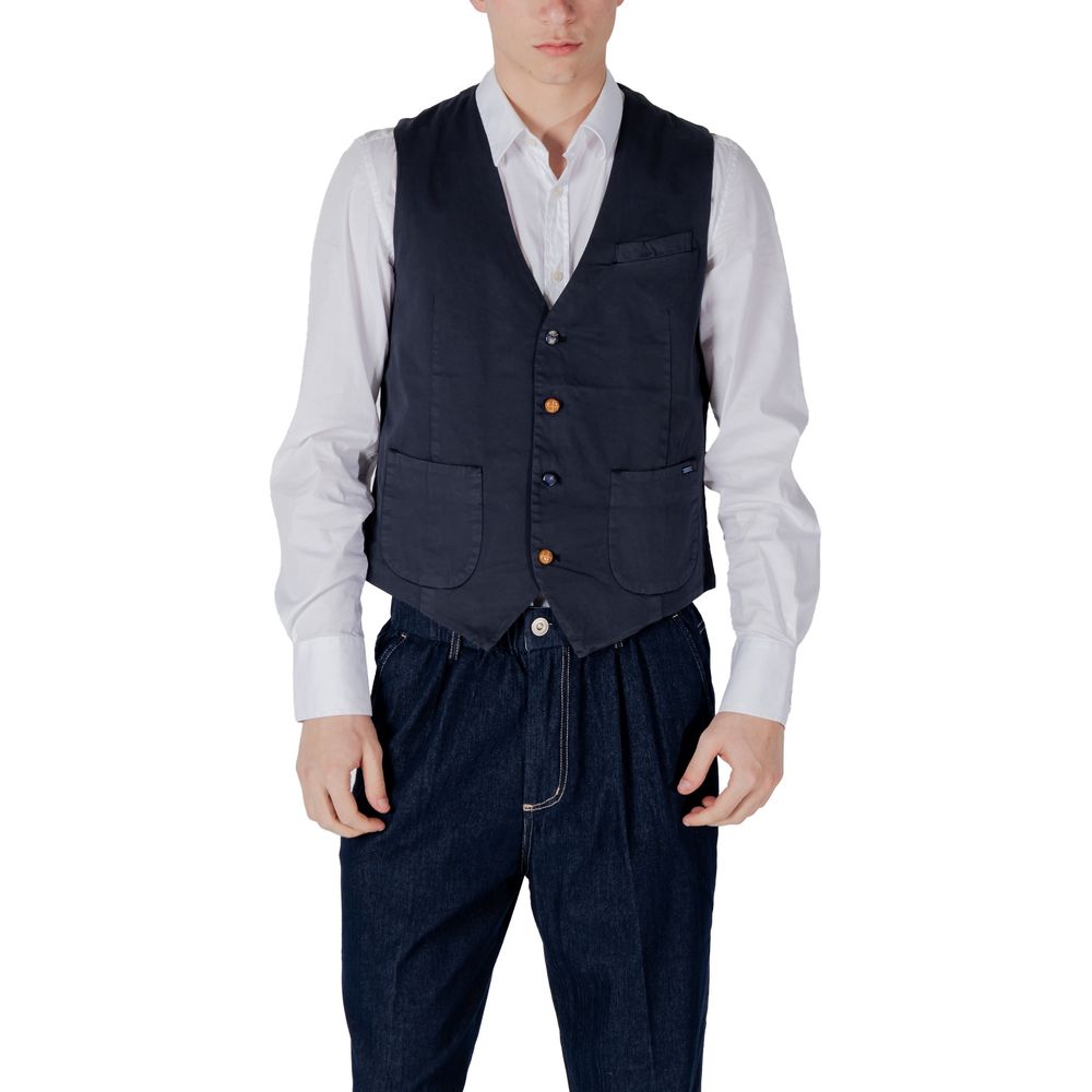 Model wearing Gianni Lupo Blue Cotton Waistcoat with white shirt and dark pants, showcasing front buttons and pockets.
