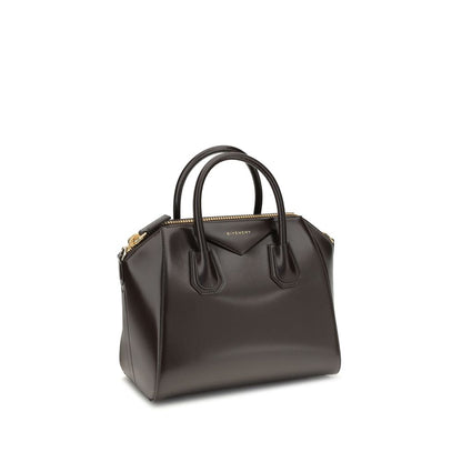 Givenchy Brown Calf Leather Bos Taurus Handbag with glossy finish and detachable strap. Antigona design with zipper and pockets.