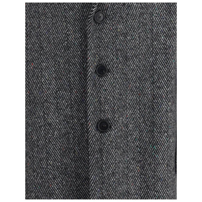 Close-up of Givenchy Gray Wool Coat with herringbone pattern and buttons, showcasing sophisticated style for AW25 season.
