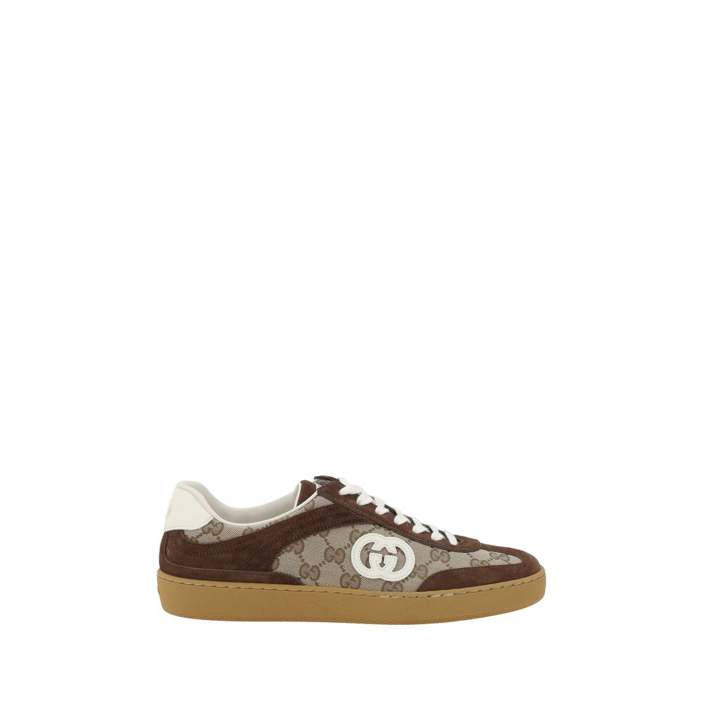 Gucci Brown Calf Leather Bos Taurus Low Top Sneakers with suede, GG fabric, lace-up closure, round toe, GG logo patch, and flat sole.