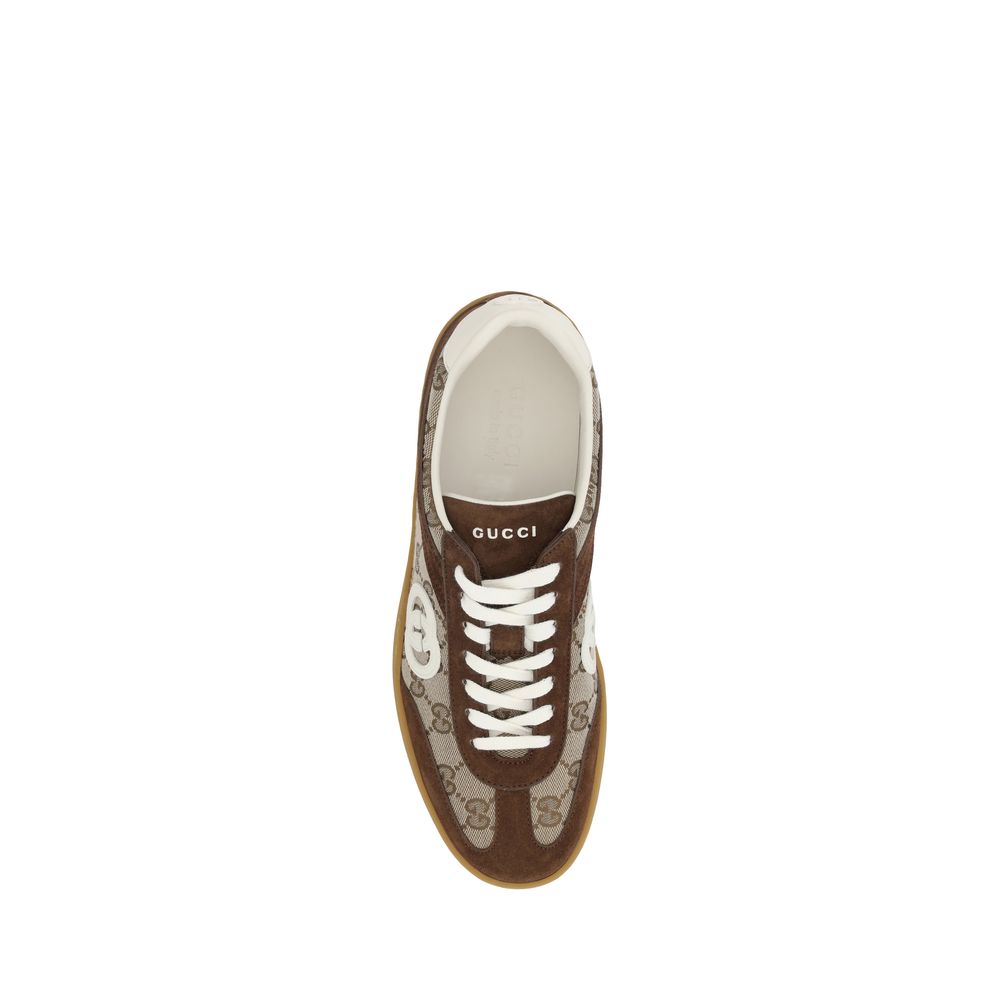 Top view of Gucci Brown Calf Leather Bos Taurus Low Top Sneakers with suede details and GG logo fabric.