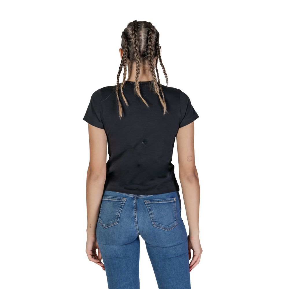 Back view of Guess Active Black Cotton T-Shirt worn by a model, showing fit and style.