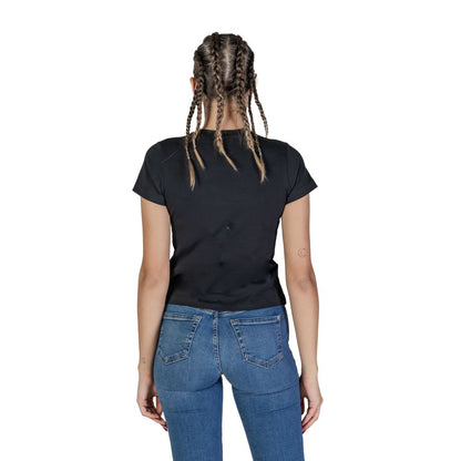 Back view of Guess Active Black Cotton T-Shirt worn by a model, showing fit and style.