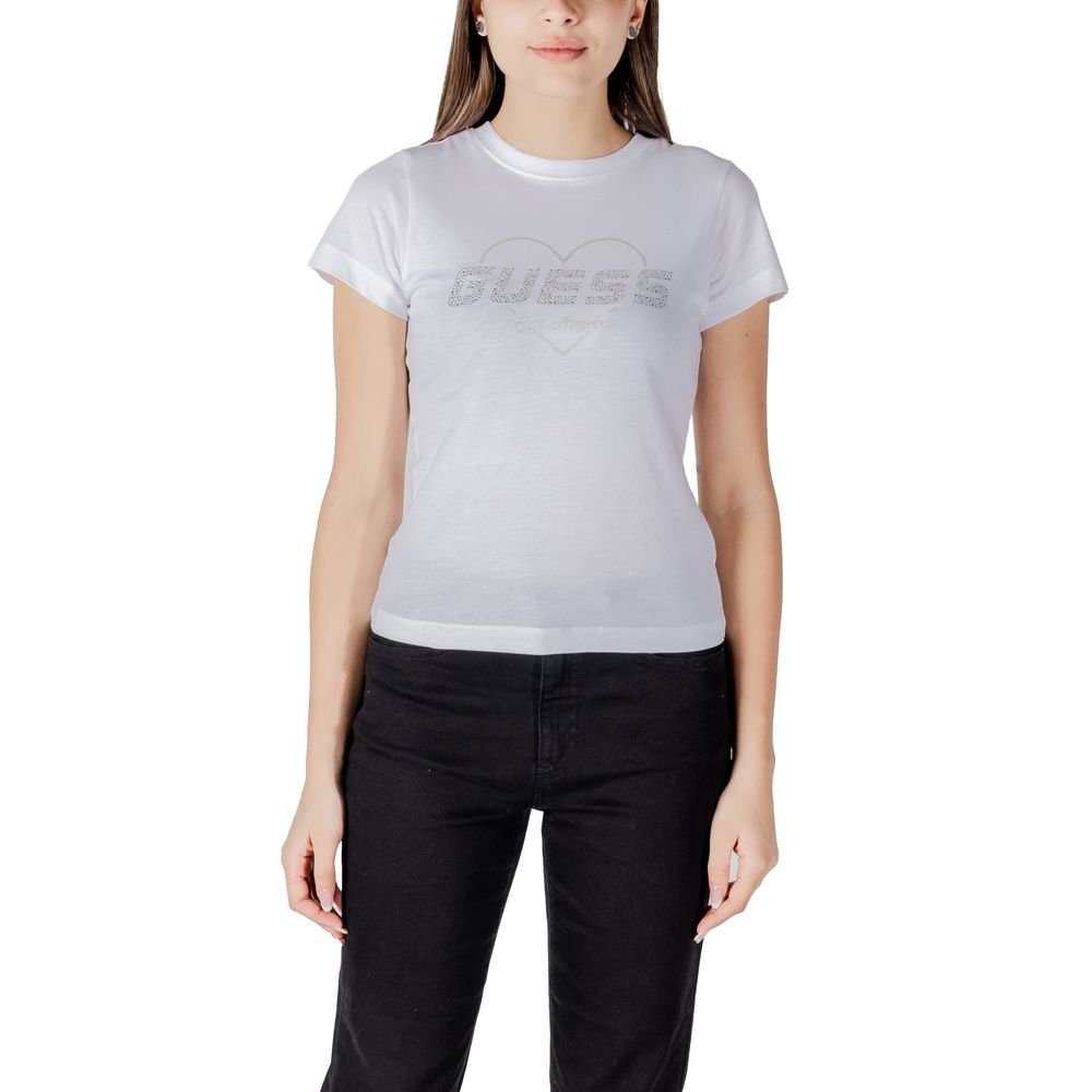 Woman wearing Guess Active White Cotton T-Shirt with logo, paired with black pants, showcasing casual and trendy style.