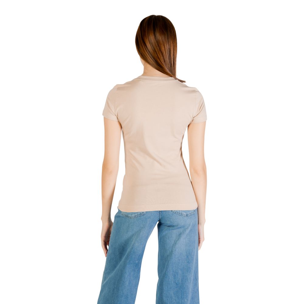 Back view of model wearing Guess Beige Cotton T-Shirt with short sleeves and classic crew neck.