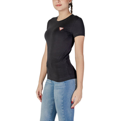 Woman wearing Guess Black Cotton T-Shirt with mini triangle logo, showcasing classic style and comfortable fit.