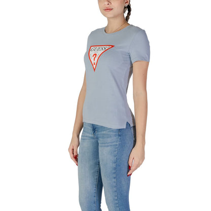 Woman wearing Guess Blue Cotton T-Shirt with logo, casual look