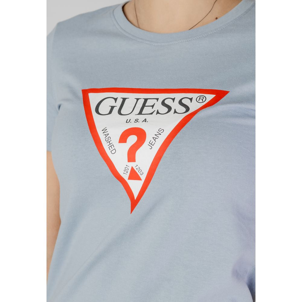 Close-up of Guess Blue Cotton T-Shirt with iconic triangle logo on chest, showcasing classic crew neck and soft fabric.