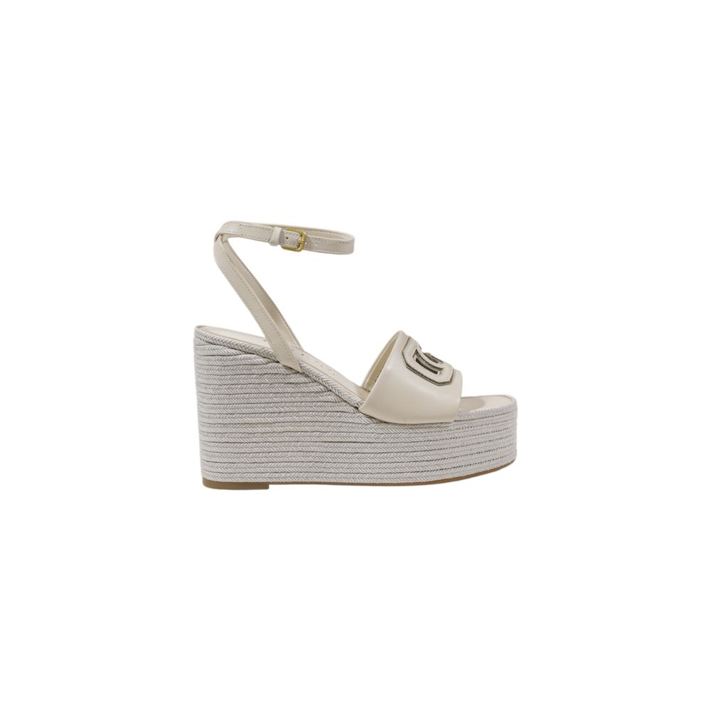 Guess Cream Synthetic High Heel Pumps with adjustable ankle strap and woven wedge texture.