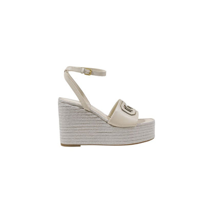 Guess Cream Synthetic High Heel Pumps with adjustable ankle strap and woven wedge texture.