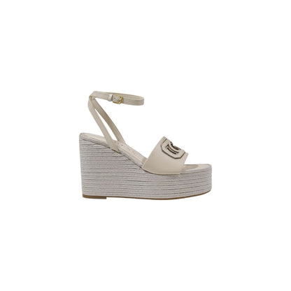 Guess Cream Synthetic High Heel Pumps with woven wedge and adjustable ankle strap, featuring raised Guess logo embellishment.