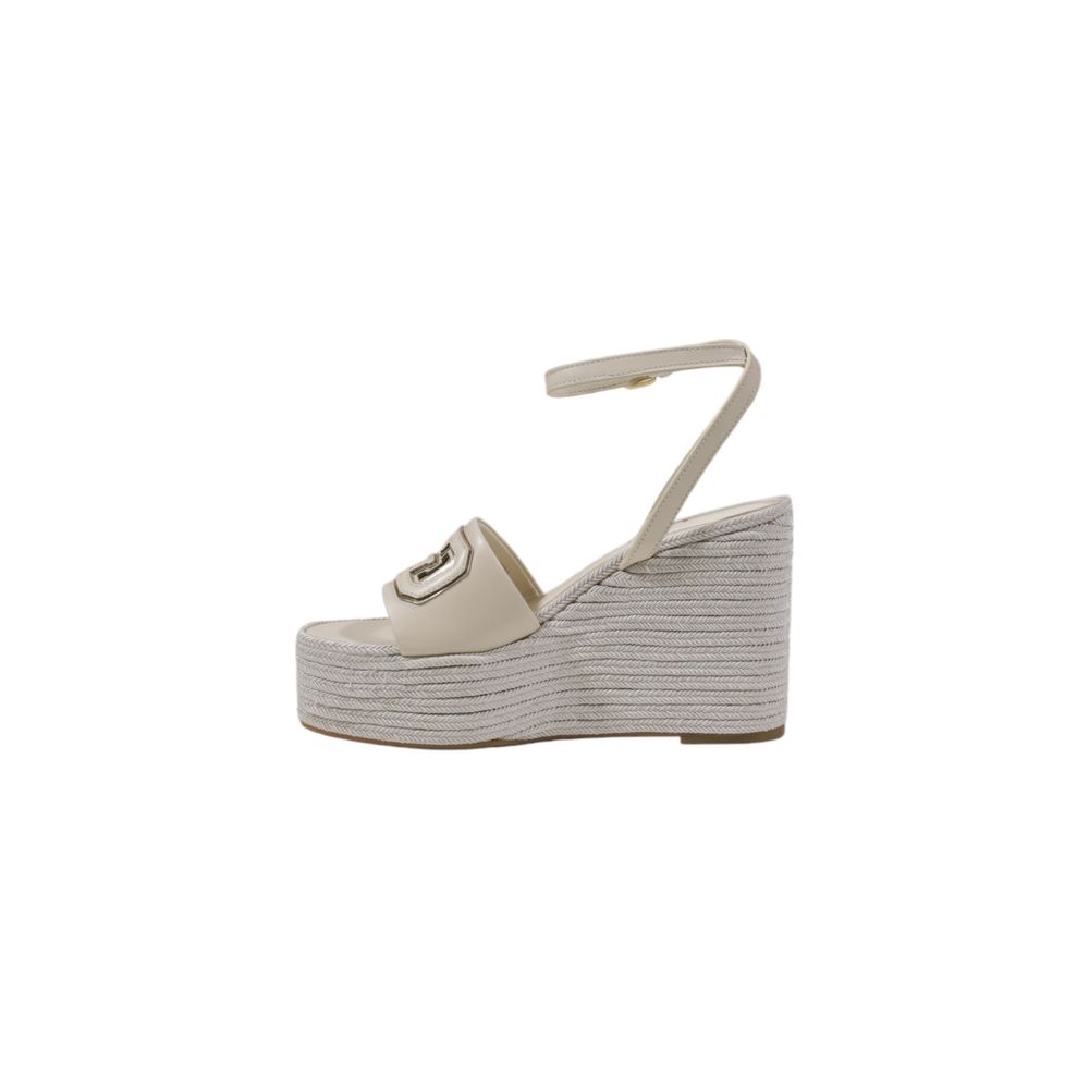 Guess Cream Synthetic High Heel Pumps with adjustable ankle strap and woven wedge texture for elegance and comfort.