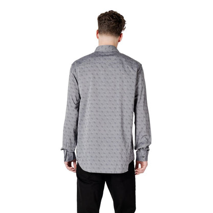 Back view of a man wearing a Guess Gray Cotton Pattern Shirt with long sleeves