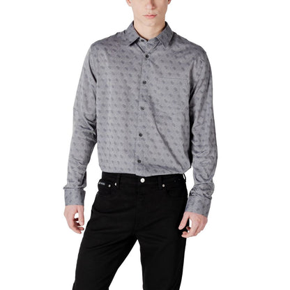 Man wearing Guess Gray Cotton Pattern Shirt with jacquard design, paired with black pants. Long-sleeve formal stylish outfit.