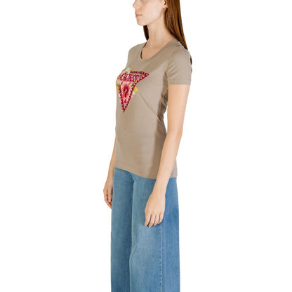 Woman wearing Guess Green Cotton T-Shirt with bead-adorned triangle design, perfect for casual occasions.