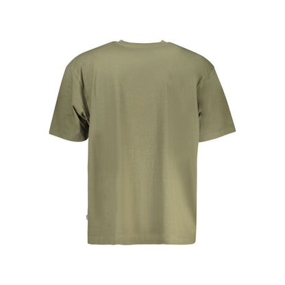 Back view of Guess Jeans Green Cotton Men T-Shirt with short sleeves and crew neck, showcasing its modern oversized fit.