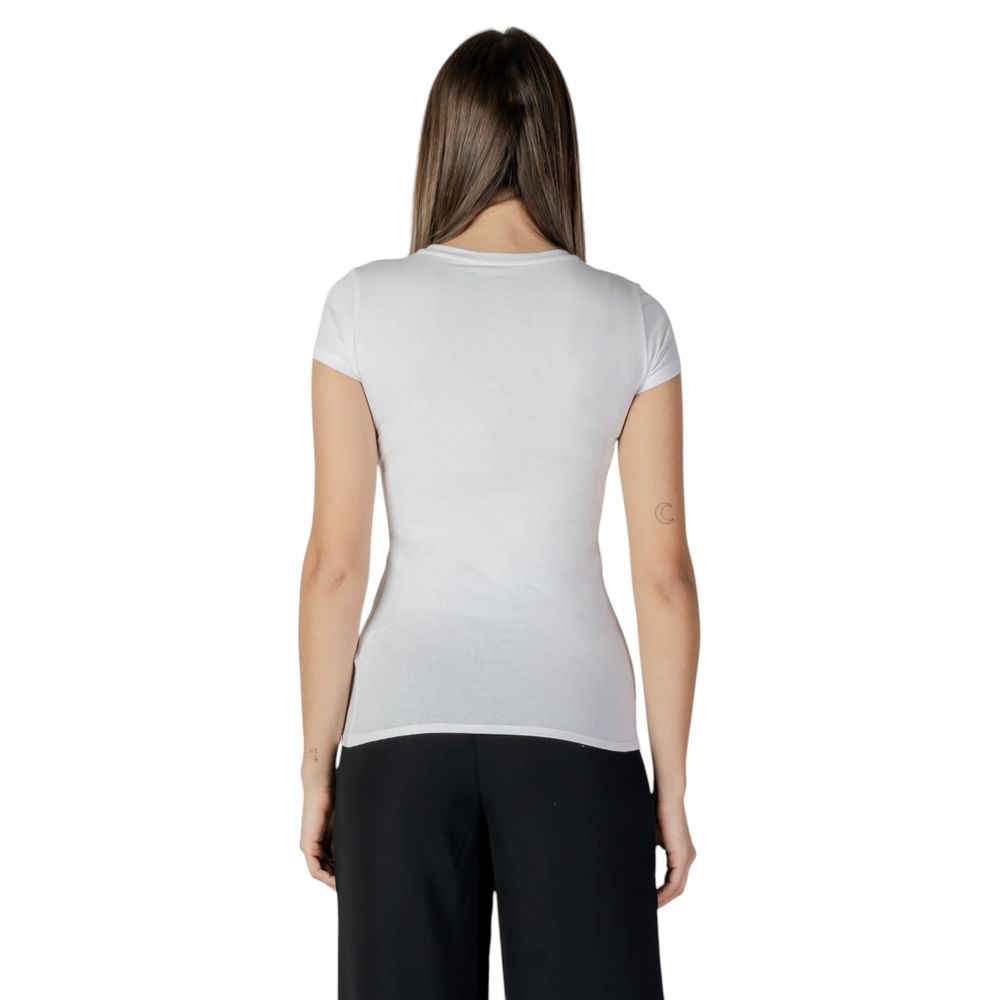 Back view of a woman wearing a Guess White Cotton T-Shirt, showcasing a sleek and comfortable fit with short sleeves.