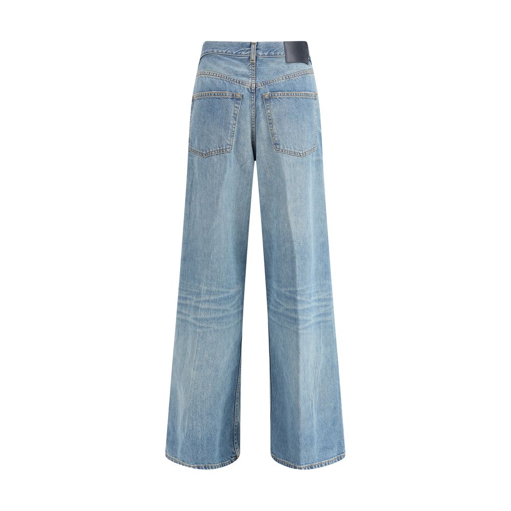 Rear view of Haikure Light Blue Cotton Jeans Denim with wide-leg and leather patch detail.